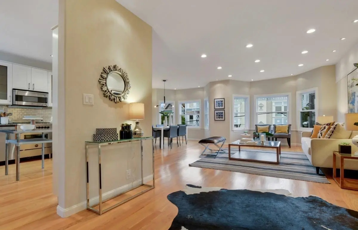 Seamless transition between dining, living, and kitchen areas in an open floor plan renovation, Lower Haight, San Francisco.