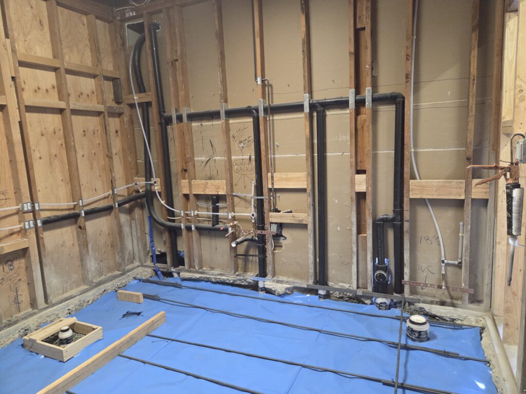 San Francisco groundwork plumbing showing ABS DWV installation for ADA bathroom with horizontal vents.